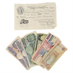 Queen Victoria 1889 silver double florin coin, four further silver coins, Queen Elizabeth II 2008 five pound coins, Bank of England Beale 1951 white five pound note, six Bank of England one pound notes, and further world banknotes