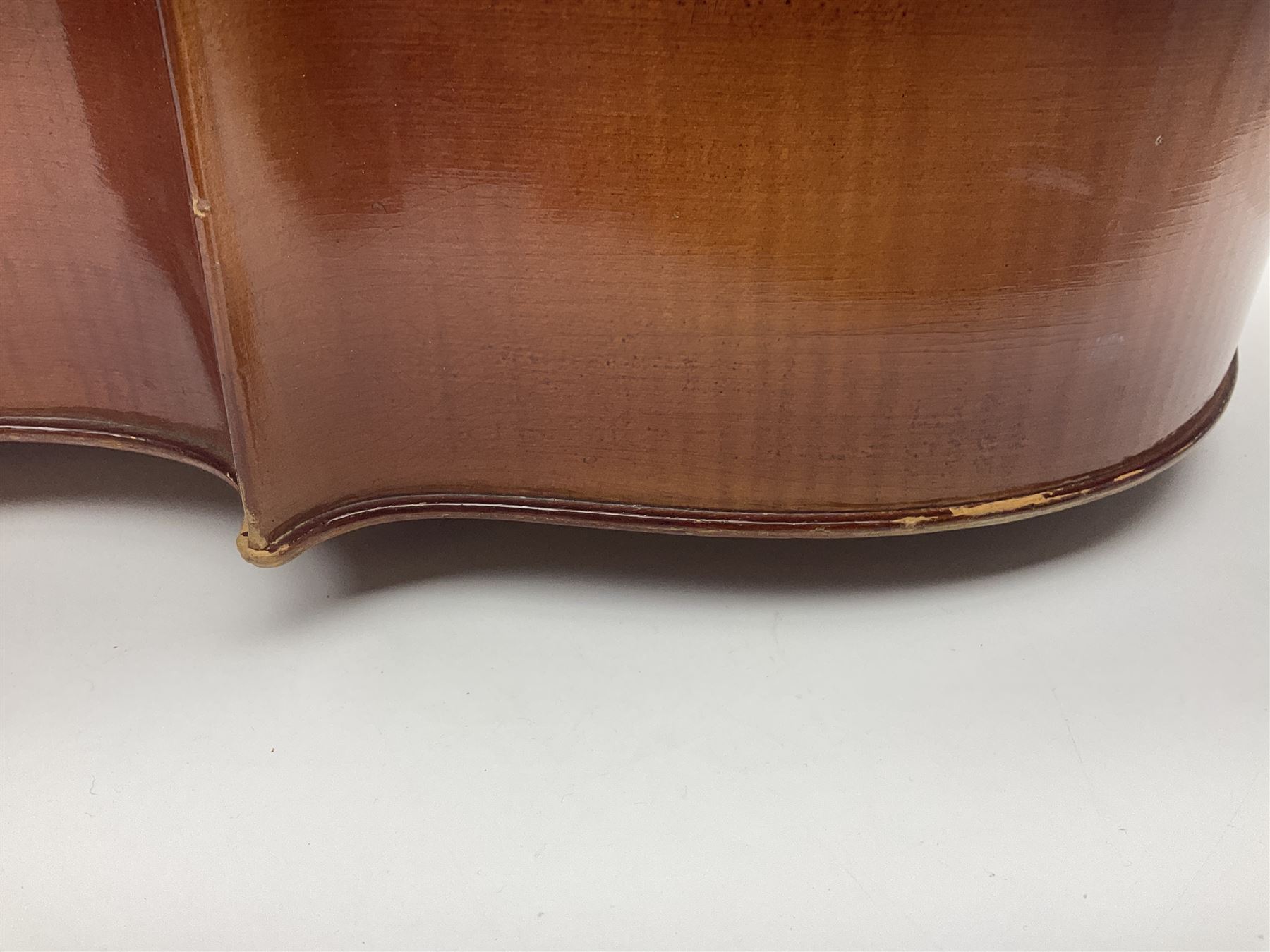 German half-size cello with 69cm two-piece maple back and ribs and spruce top; L112.5cm overall; in soft carrying case with two bows