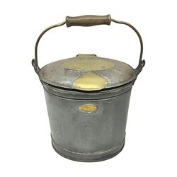 Late 19th/early 20th century steel and brass dairy pail or can, of oval form with swing handle, brass plaque to front and hinged cover inscribed 'F & T Ross Ltd Dairy Outfitters Hull', and 'New Milk F Clappison Dairy Farmer Hull', not including handle H30cm