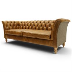Contemporary Chesterfield design 'Caesar' three seat sofa, traditional shape with out-swept arms, upholstered in tan leather with loose seat cushions, the back, sides and buttons upholstered in chevron stitched Harris Tweed, on turned feet