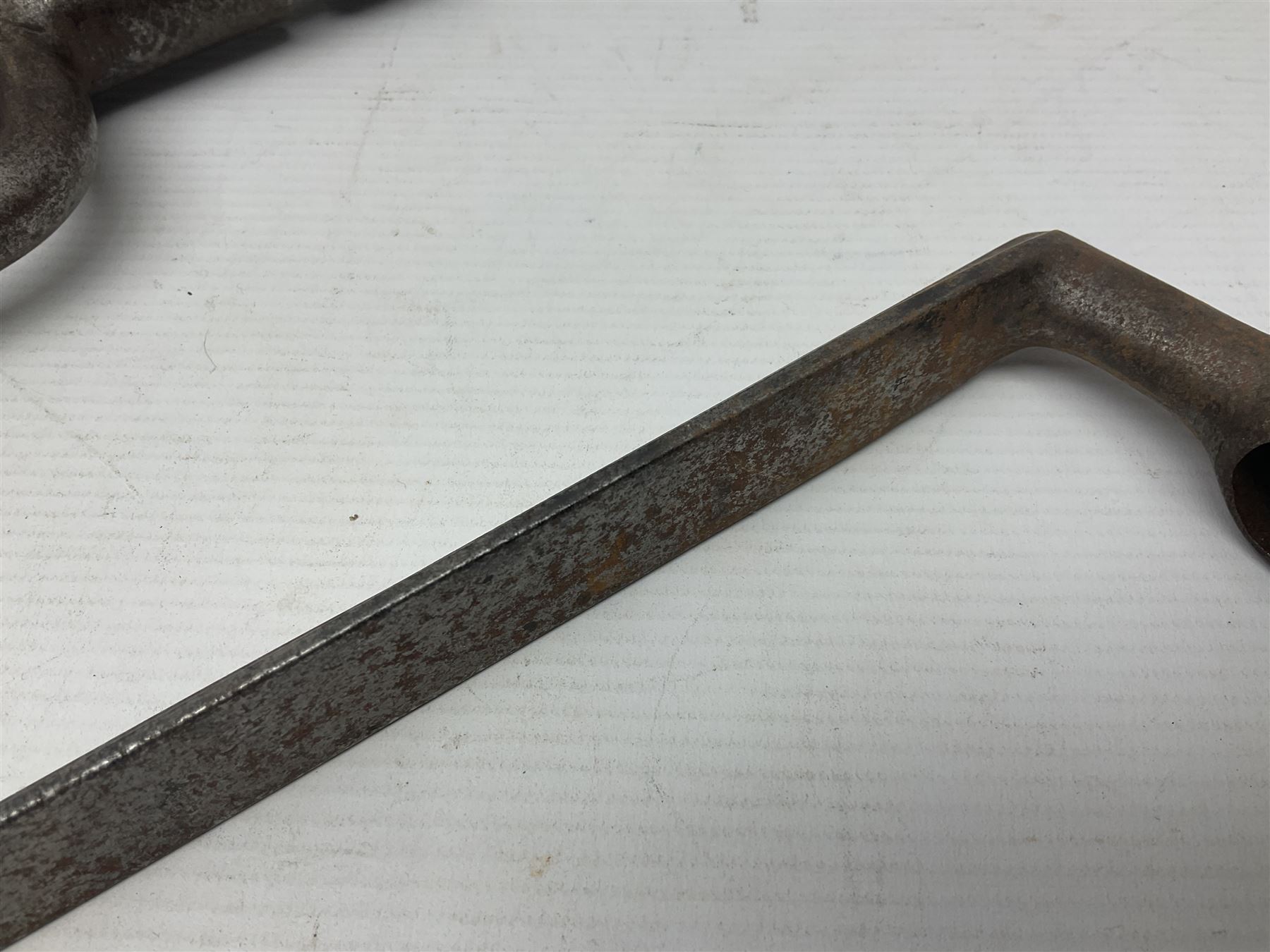 Early 19th century British Brown Bess musket rifle socket bayonet with zigzag fitting stamped D71 and triangular blade stamped 270 L55cm overall; and two other 19th century socket bayonets; no scabbards (3)