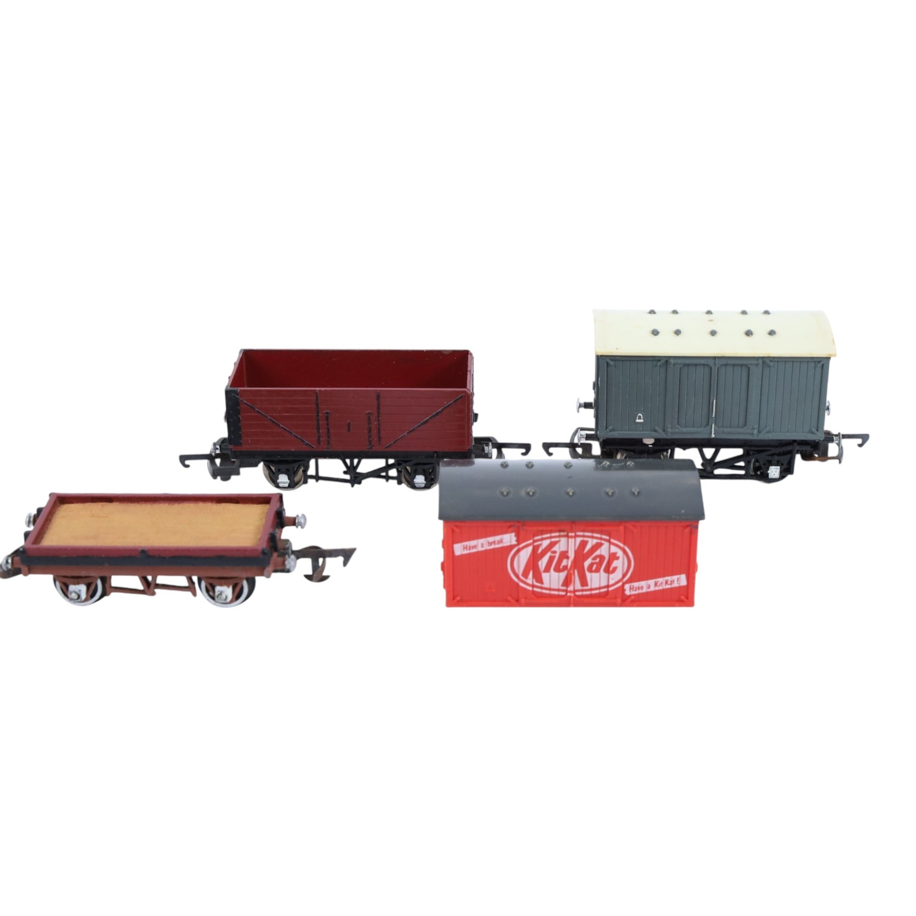 Collection of model railway locomotives, track and accessories, including Mettoy tin plate clockwork 0 gauge locomotive, tender and three coaches, boxed Hornby 00 gauge Thomas the Tank engine locomotive and two wagons, loose 00 gauge rolling stock and track and some kit built buldings, etc