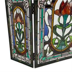 Art Nouveau design stained glass three panel fire screen, decorated with tulips and interlacing borders