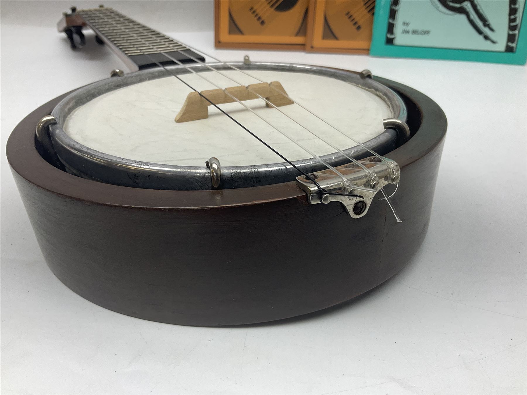 W.D. Keech banjolele pat.219720/23 with etched signature to the back; serial no.A12082 L55cm; and a restored Italian mandolin with segmented lute back; together with three music books