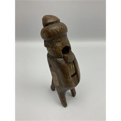 Rare primitive treen lever action nutcracker, probably late 17th/early 18th century, carved in the form of a man, with old collector label to side inscribed 'A Nutcracker XVI Century', H18cm
