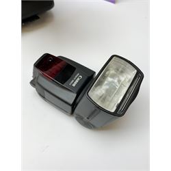 Canon EOS 5D camera body with Canon 'BG-E6' battery grip, Canon 'Speedlite 580EXII' flash and Canon lens 'Canon Zoom Lens EF 24-105mm 1:4 L IS USM' with Canon EOS 5D Mark II instruction manual