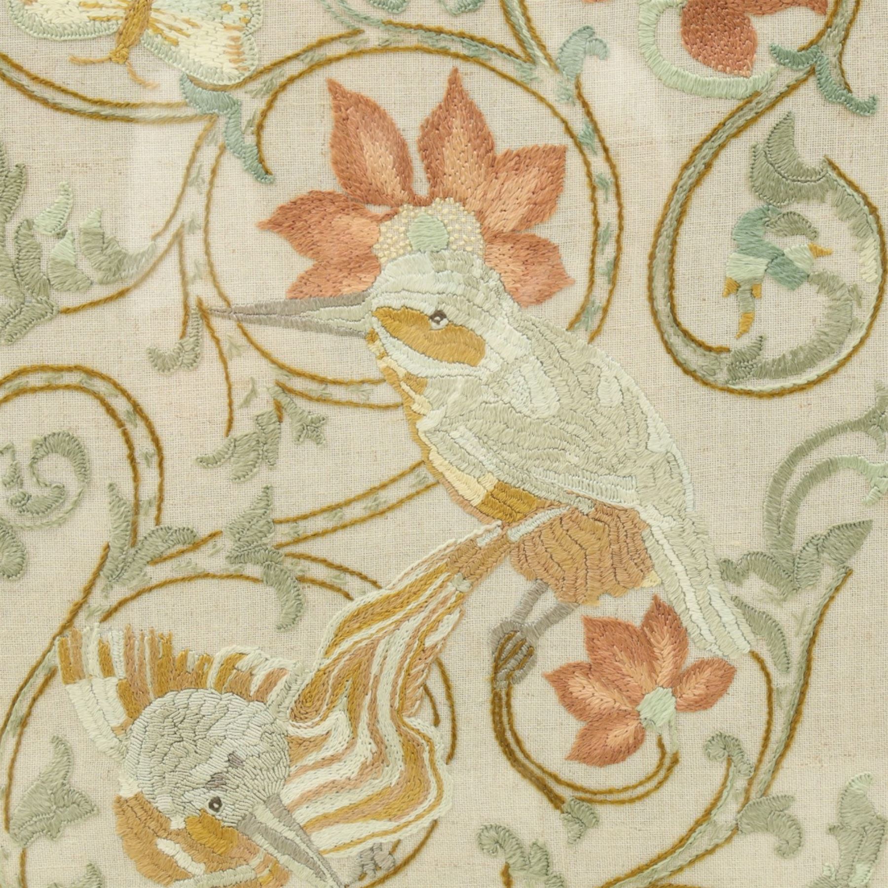 Victorian mahogany firescreen, rounded rectangular frame inset with embroidered panel depicting exotic birds amongst scrolling flowering foliage and butterflies, on out-splayed feet