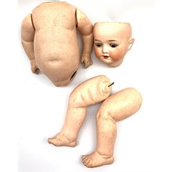 Heubach Koppelsdorf Germany bisque head doll for assembly with sleeping eyes, open mouth with tooth and tongue and composition body with jointed limbs, impressed 'Heubach Koppelsdorf  320.4 Germany' H50cm