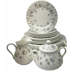 Wedgwood April Flowers pattern dinner and tea wares, comprising teapot, milk jug, sugar bowl and cover, six cups, seven saucers, sauce boat, meat platter, six dinner plates, six side plates, dessert plates and two tureens with covers. 