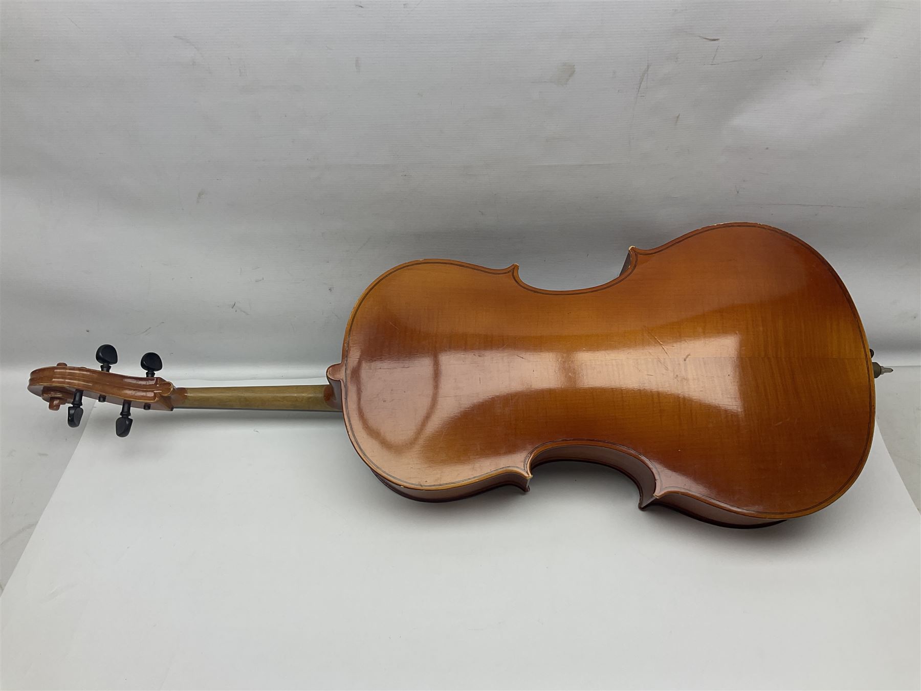 German half-size cello with 69cm two-piece maple back and ribs and spruce top; L112.5cm overall; in soft carrying case with two bows