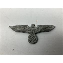 Five WW2 German peaked cap badges, four with double-pinned backs
