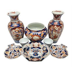 Pair of Japanese Imari vases with floral decoration, together with two Imari shell dishes etc, vases H24cm