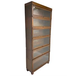 Globe Wernicke - oak six-tier library bookcase, enclosed by six glazed up-and-over doors, on square block feet