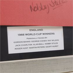 Signed 40th anniversary 1966 England World Cup shirt, signed by Gordon Banks, George Cohen, Ray Wilson, Jack Charlton, Alan Ball, Nobby Stiles, Roger Hunt, Martin Peters and Geoff Hurst, framed with certificate of authenticity from Richard Hill verso, frame H91cm