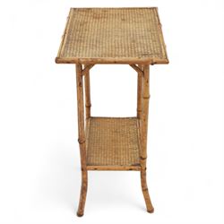 Early 20th century mahogany side table; with bedside cabinet, shaped rectangular top on barley twist supports united by stretchers (H 72cm, W 42cm, D 45cm), together with a Late Victorian tiger bamboo occasional table, rectangular two-tier form with woven cane surfaces, the upper tier with raised edge above splayed supports with naturalistic jointing (H 70cm, W 52cm, D 36cm)