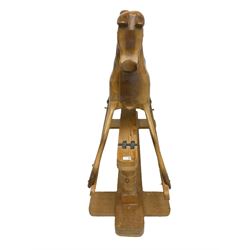 Terry White for White Horses (Hertfordshire 20th century) - Carved pine rocking horse, raised on a pine trestle base