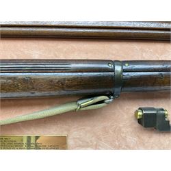 WW2 Lee Enfield No.4 Mk.1 .303 bolt-action rifle with hinged butt compartment, made by SA Ltd., Long Branch, Canada 1942, serial no.5L0646 L113cm; mounted on a framed display board with No.4 Mk.II spike bayonet, No.9 Mk.1 blade bayonet, two inert 5-round clips and brass biographical plaque by Antler Military Originals detailing DA Cert No.C3444 OLD STYLE DEACTIVATION SO FIREARMS CERTIFICATE REQUIRED OR RFD