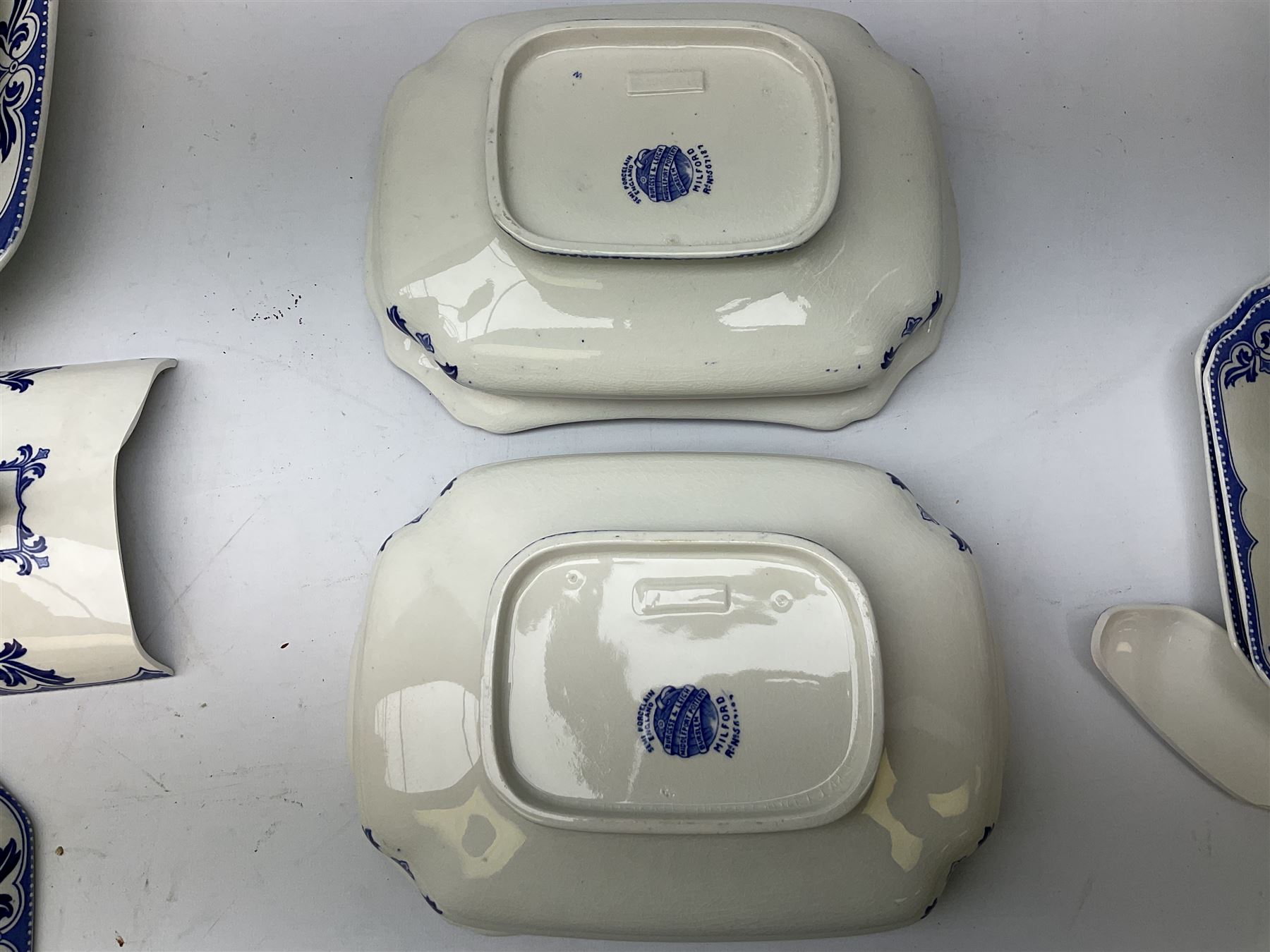 Burgess and Leigh Middleport pottery dinner wares decorated in the ‘Milford’ pattern, to include lidded tureens, graduated meat plates, dinner plates etc 