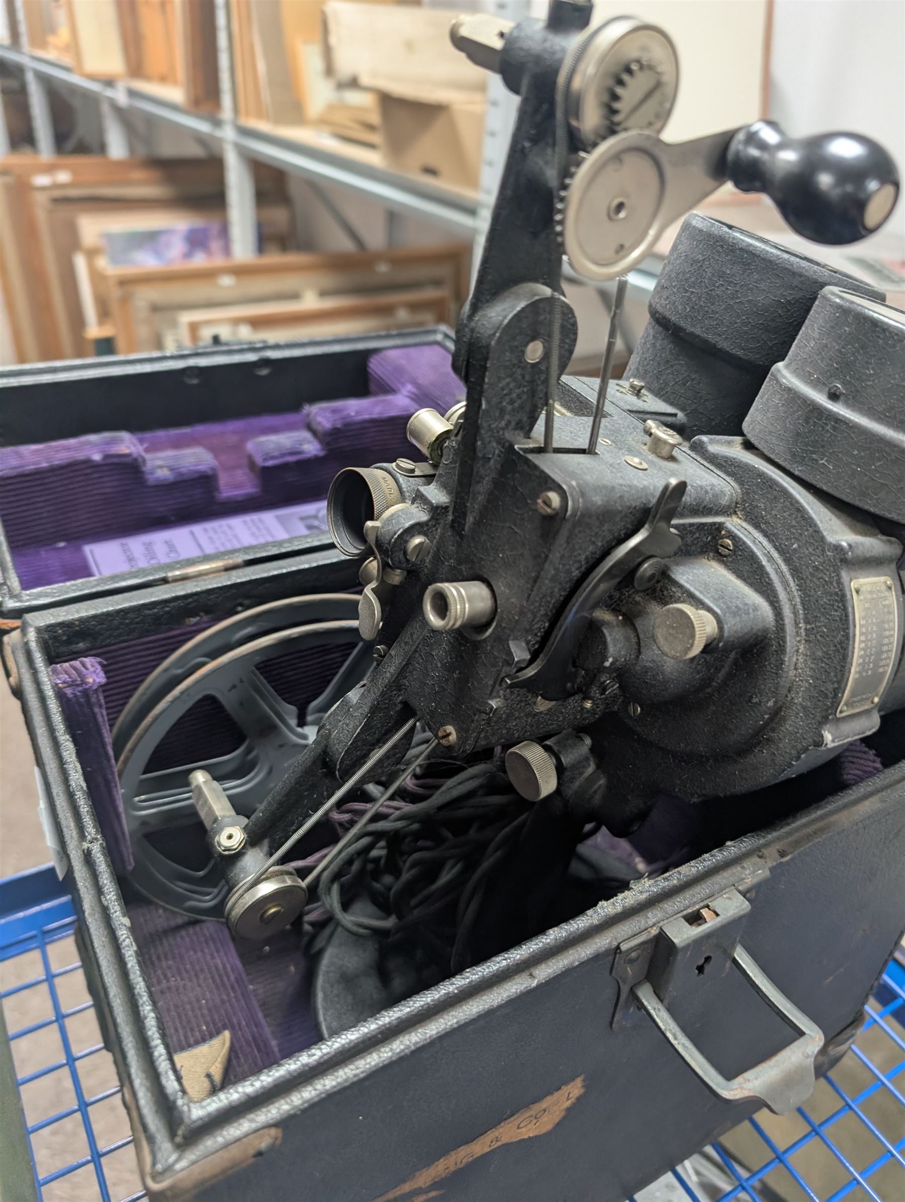 Collection of projectors, including Bell & Howell 613 cine projector, E J Arnold slide projector, Bolex home projector, Aldis 303, Bell & Howell Filmo 57 model projector, Leitz Wetzlar Pradovit Color, Kodak Instamatic M55L movie projector and a Gnome slide projector