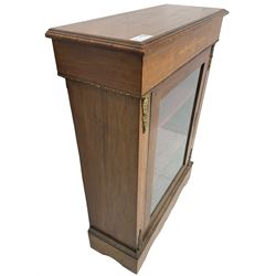 Victorian walnut pier cabinet, moulded rectangular top over inlaid frieze, enclosed by single glazed door, the uprights inlaid with extending stylised foliage decoration and cast gilt metal mounts, on moulded plinth base