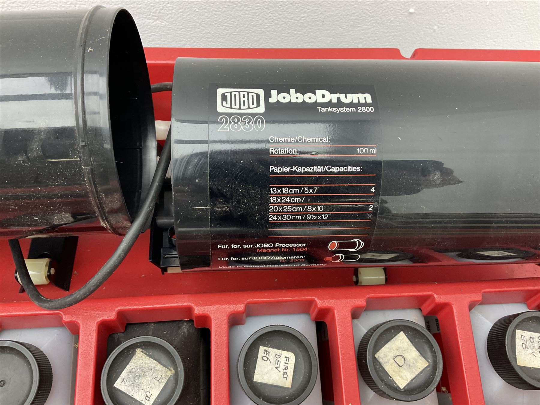 Jobo Colorprocessor CPA 2  fitted with a JoboDrum 2830 drum, DrumModul 2870, three plastic cylinders and six chemistry storage bottles, Jobo Colorprocessor CPA 2, fitted with JoboDrum 4531, four plastic cylinders and 4 chemical storage bottles, and nineteen development trays of various sizes, all untested