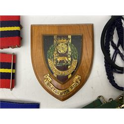 Miscellaneous militaria including two Royal Artillery and one Royal Horse Artillery stable belts; Northamptonshire Regiment trench art brass shell case lighter; unused Matchless Fire-Set; pocket knives and multi-tool; lanyards; oak shield with York & Lancaster crest etc