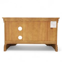 Oak Furnitureland - television and media cabinet, rectangular top with framed edge, fitted with single cupboard and open shelved section, on a stepped and shaped plinth