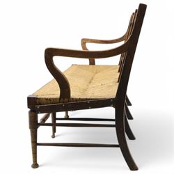 Liberty & Co. London - circa. 1890s ‘The Wykeham’ settle or bench, reeded frame and rush seat, on turned supports united by turned stretchers

The promotional sketch for ‘The Wykeham’ range can be seen in the ‘Liberty & Co. Handbook of Sketches, 1889’ p.49. It is also reproduced in Daryl Bennett’s ‘Liberty’s Furniture 1875-1915 […]’ p.106. Referred to as ‘The Wykenham: ‘oaken furniture’’. See images. 

