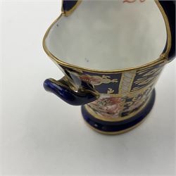 Group of Crown Derby and Royal Crown Derby Imari pattern miniatures, including mid 19th century Stevenson and Hancock cauldron, with painted mark beneath, H5.5cm, a near pair of early Royal Crown Derby scuttles, decorated in the 6299 pattern, each with printed and painted marks beneath including illustration date codes for 1913 and 1922, tallest 6.5cm, and a further early 20th century Royal Crown Derby scuttle, decorated in the 6299 pattern, with printed and painted marks beneath including illustration date code for 1922, H5.5cm, (4)
