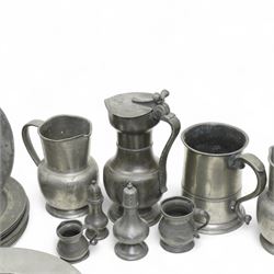 Large collection of 18th century and later pewter plates, of graduating sizes, and a group of tankards, various touch marks and impressions