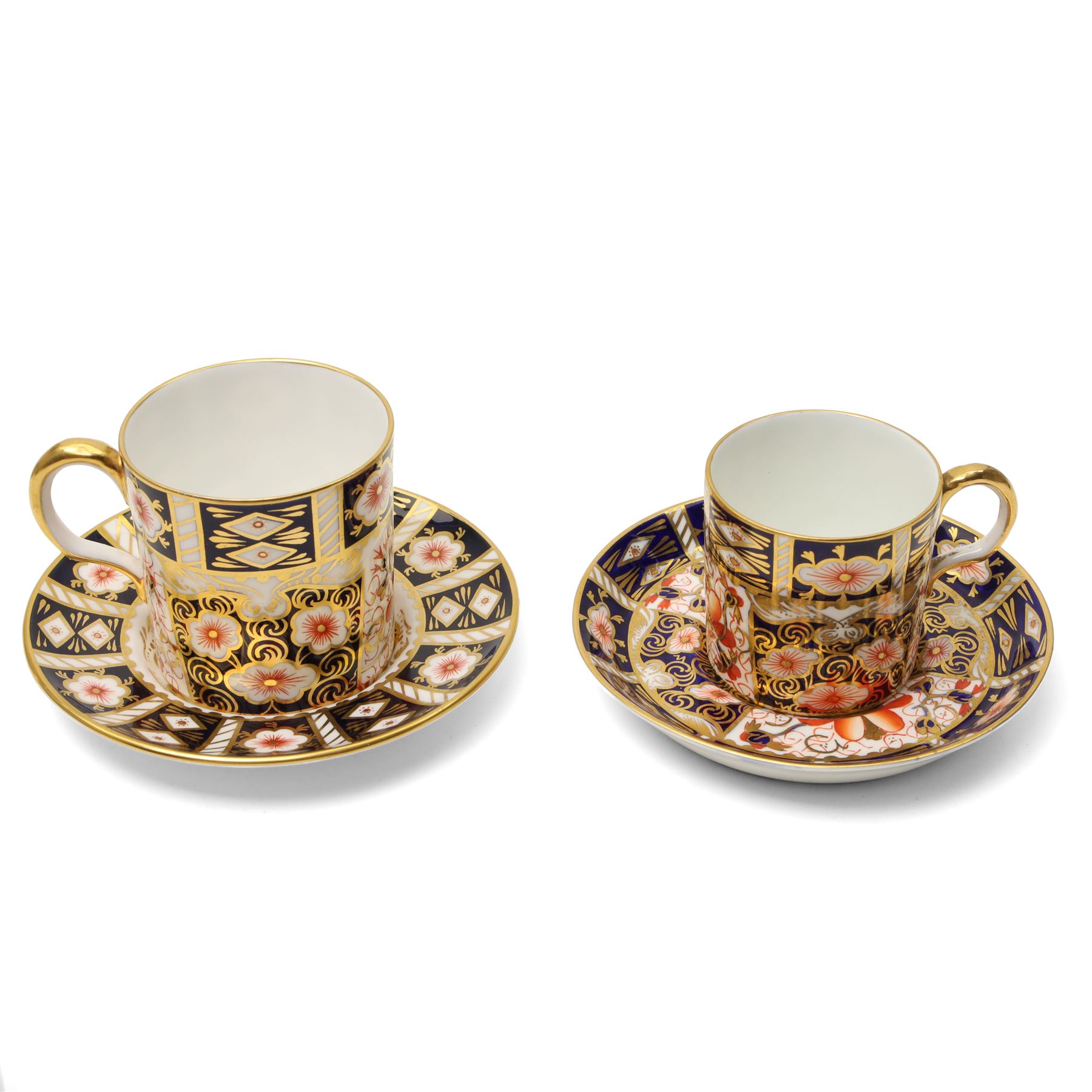 Royal Crown Derby pattern 2451 items, comprising smaller and larger coffee cans with saucers, crescent pin tray and plate (D23cm), together with a boxed Yorkshire Rose pattern plate, and a 1999 'Rabbit' year tray