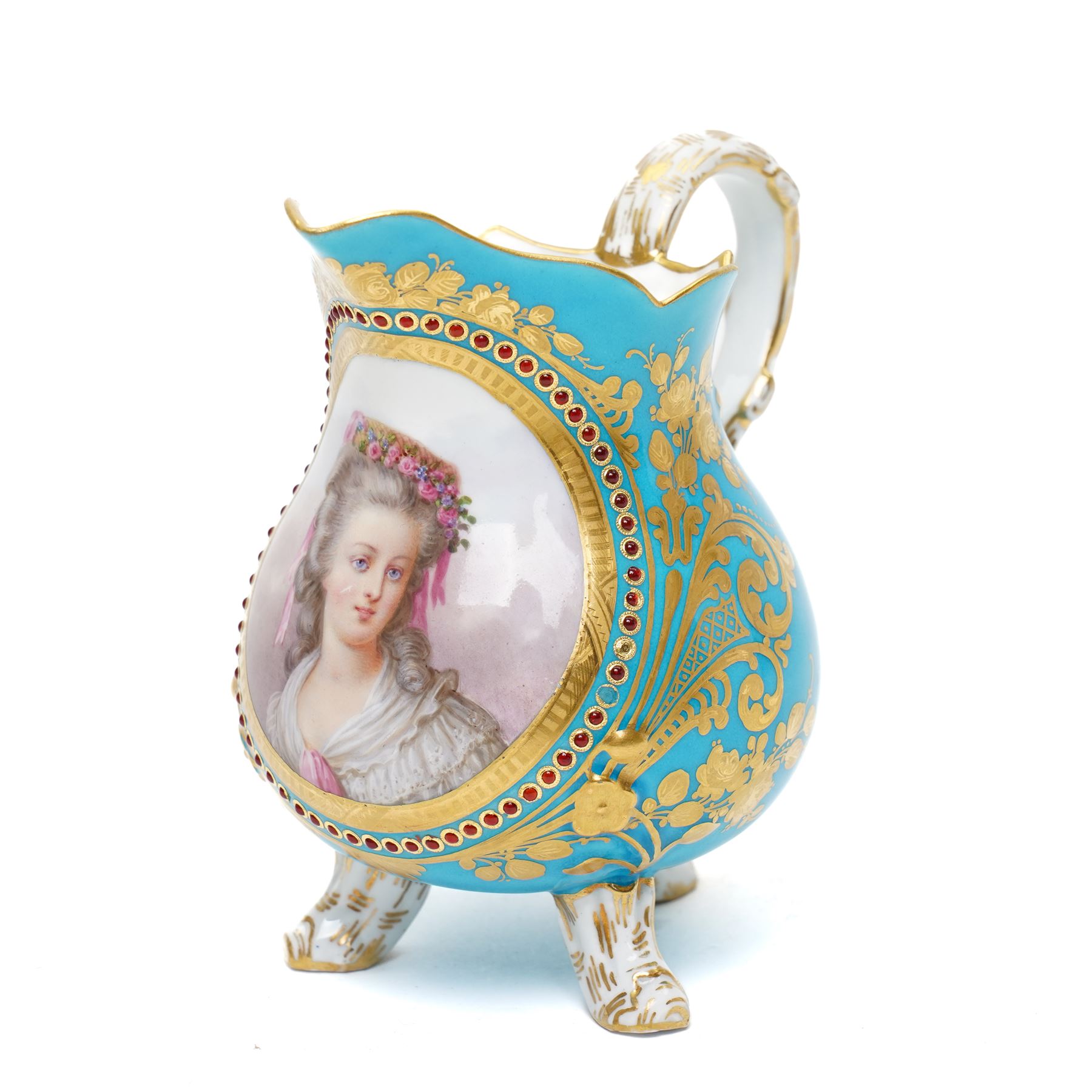 Sevres dejeuner 'Bleu turquoise' tea service for six covers, decorated by Charles-Eloi Asselin, comprising six teacups and saucers, teapot, milk jug and covered sucrier, the bleu de ciel ground painted with portraits of the French courtiers, each piece with name to base (some rubbed) of those depicted, to include Marie Antoinette (teapot), Madame de Montesson, Madame du Barry, Madam de Genlis, Madame Elizabeth (sucrier), Madame de Lamballe (milk jug) Madame Victoire, and two others unidentified, within finely painted gilt surround, each portrait encircled by red jewelled borders, the saucers with corresponding monograms within similar floral gilt and jewelled borders, Sevres mark to base with painted 'ee', dating these 1782, teapot H14cm 