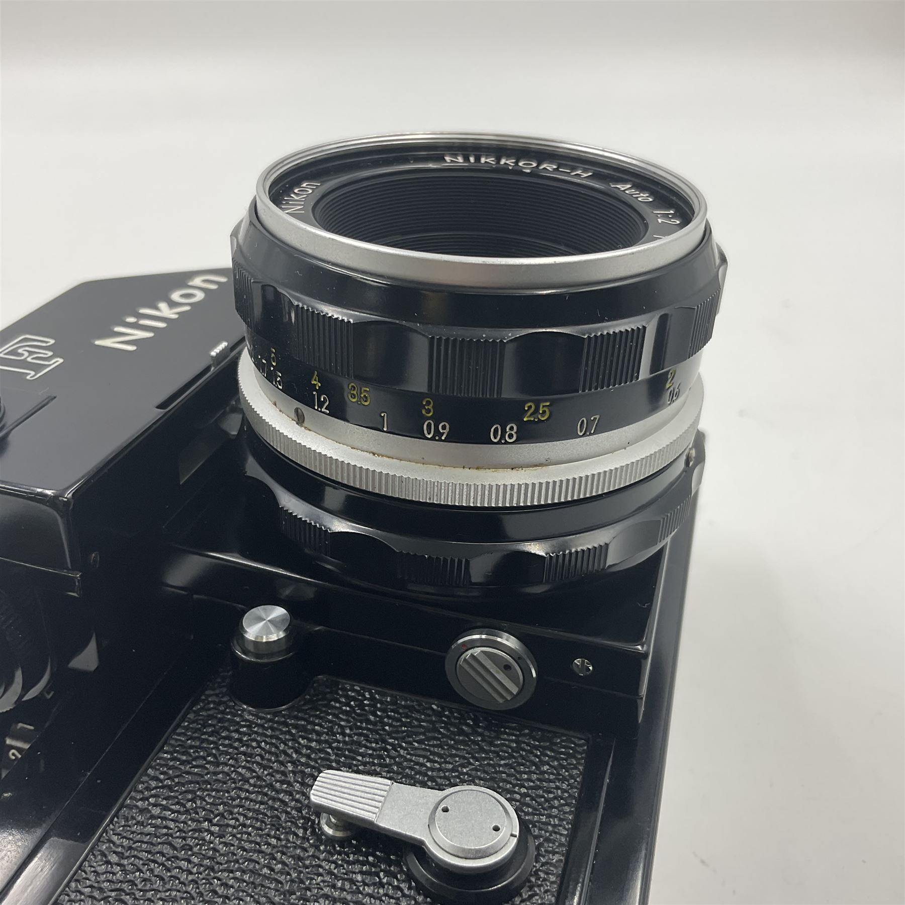 Nikon F Photomic camera body, serial no. 6543350, circa 1964, with 'Nikon NIKKOR-H Auto 1:2 f=50mm' lens, serial no. 1002112
