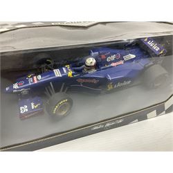 Three Paul's Model Art Grand Prix 1:18 scale die-cast racing cars - Williams Renault FW17 D. Hill; Ferrari 412 T1 J. Alesi; and Ligier Honda JS41 M. Brundle; all boxed (3)