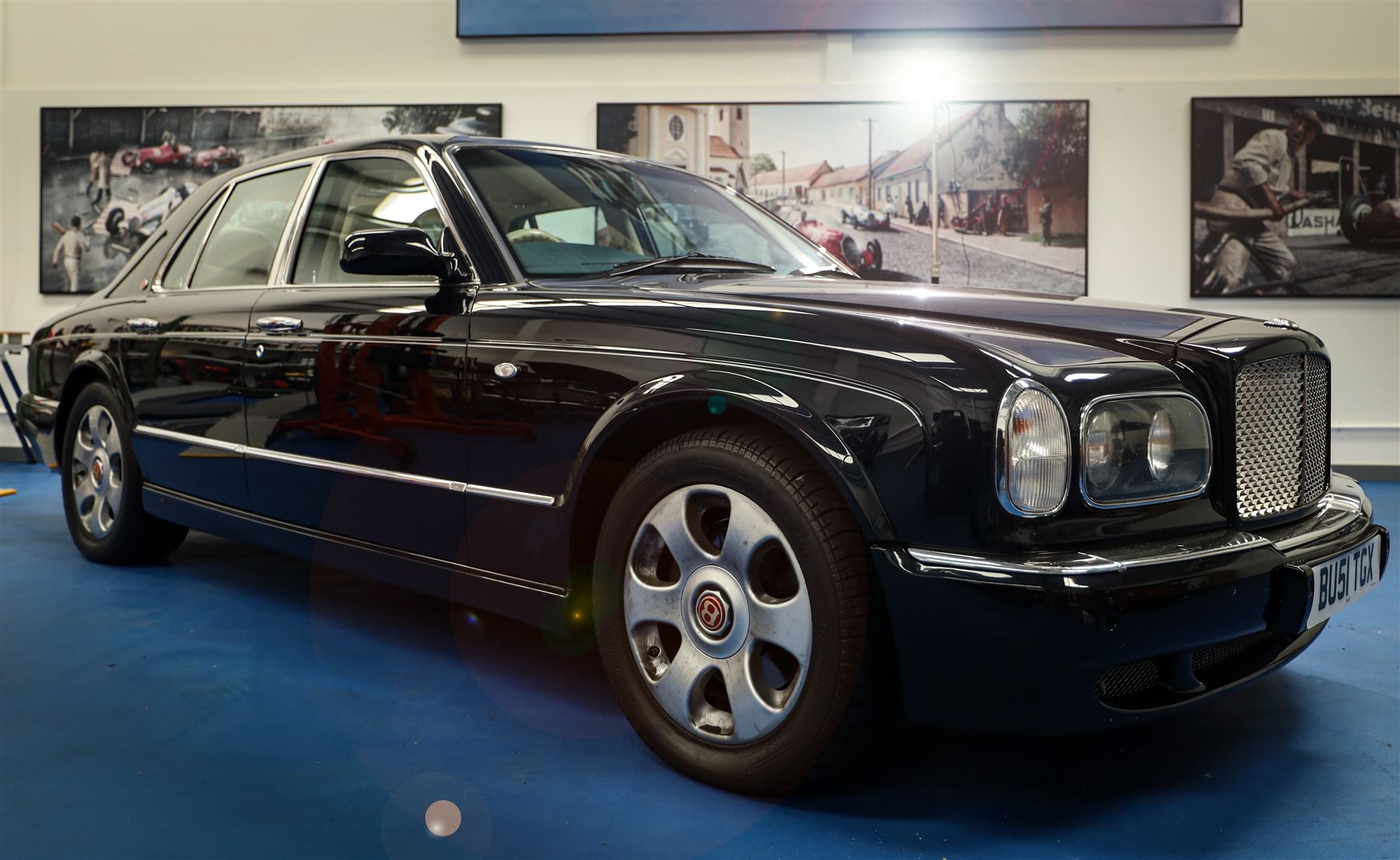 2001 Bentley Arnage Red Label Saloon

Registration: BU51 TGX
Engine: 6.75-litre turbocharged V8 petrol
Transmission: Automatic
Odometer reading: 39,942 miles
Colour: Black Sapphire metallic
Interior: Magnolia leather with burr walnut veneers
Previous owners: 3
V5C: Present
Service history: Good service records

An exceptional Bentley Arnage Red Label Saloon, finished in Black Sapphire metallic, a very dark blue, with a Magnolia leather interior, contrasting dark blue carpets and extensive burr walnut veneers. The car displays an odometer reading of approximately 39,942 miles.

The Arnage Red Label combined Bentley’s renowned 6.75-litre turbocharged V8 engine with automatic transmission, delivering effortless performance in a traditionally appointed luxury saloon. The model is distinguished by its imposing proportions, characteristic Bentley radiator grille and finely crafted interior.

Presented in excellent condition throughout, the bodywork and metallic paint finish appear particularly well preserved, complemented by clean brightwork and the correct Bentley alloy wheels. The engine bay is also notably well detailed.

The interior presents exceptionally well, retaining its Magnolia leather upholstery, polished burr walnut veneers, original factory instrumentation and switchgear. The leather displays only light creasing consistent with careful use.

The car has had three previous owners and is accompanied by good service records.

Features

• 6.75-litre turbocharged V8 petrol engine
• Automatic transmission
• Black Sapphire metallic paintwork
• Magnolia leather interior
• Contrasting dark blue carpets
• Burr walnut veneers
• Electrically adjustable front seats
• Air conditioning
• Factory instrumentation and switchgear
• Bentley alloy wheels
• Right-hand drive
• Odometer reading of approximately 39,942 miles
• Three previous owners
• Good service records
• V5C present

This vehicle forms part of the Estate of the Late John Sills and is offered for sale by the Executors, confirming a genuine reason for sale.