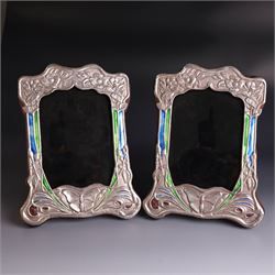 Pair of silver mounted Art Nouveau style photograph frames, with enamel butterfly and flor...