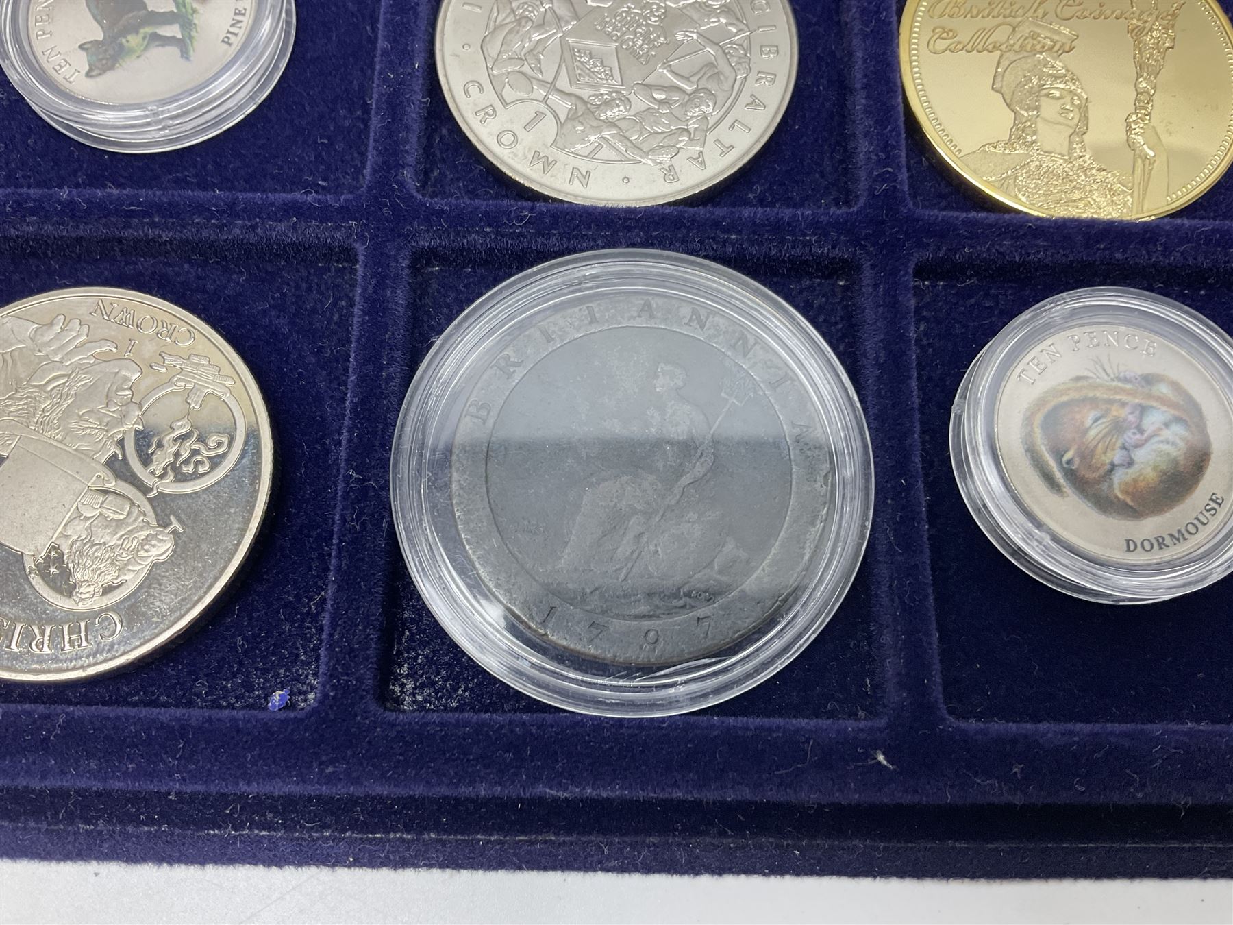 Commemorative, fantasy and other coinage, including George II 1754 farthing, George III 1773 farthing, cartwheel penny and cartwheel two pence, Queen Victoria Canada 1886 twenty five cents, various commemorative crowns etc, housed in three blue coin trays