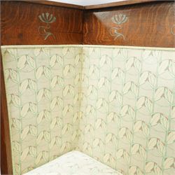 James Shoolbred & Co. (1814-1934) - Arts & Crafts high-back oak settle or hall-bench, the projecting cresting rail over a frieze decorated with stylised poppy pewter inlays, the drop-in sprung seat beneath high back and arms, flanked by tapering uprights terminating to shaped stile feet, upholstered in Archibald Knox patterned fabric with the original tapestry and horsehair upholstery beneath, applied plaque by James Shoolbred to underside, with stamped serial number W1573, circa 1890