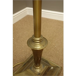  Burnished brass finish standard lamp on reeded column, H145cm (This item is PAT tested - 5 day warranty from date of sale) and a reproduction mahogany wine table with octagonal inset leather top, D45cm, H51cm   