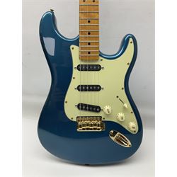 Fender Stratocaster style electric guitar in metallic blue with Rio Grande pick-ups and Fender back-plate L98cm; in Fender soft carrying case