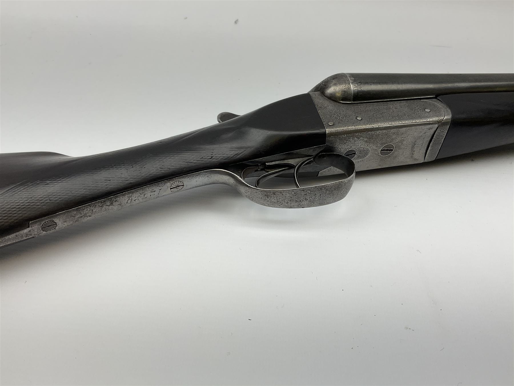 Charles Boswell 12-bore side-by-side double barrel box-lock non-ejector sporting gun, with 71.5cm sleeved barrels, thumb safety, walnut stock with chequered grip and fore-end, serial no.12720, L112.5cm overall SHOTGUN CERTIFICATE REQUIRED