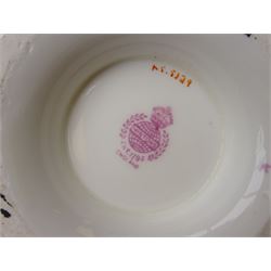 19th century Minton tea set, comprising twelve teacups, eleven saucers, fifteen side plates, cream jug, slop bowl, and two cake plates, decorated with panels of floral sprays, upon a green ground, heightened with gilt throughout, with printed puce mark beneath, and pattern number 5329
