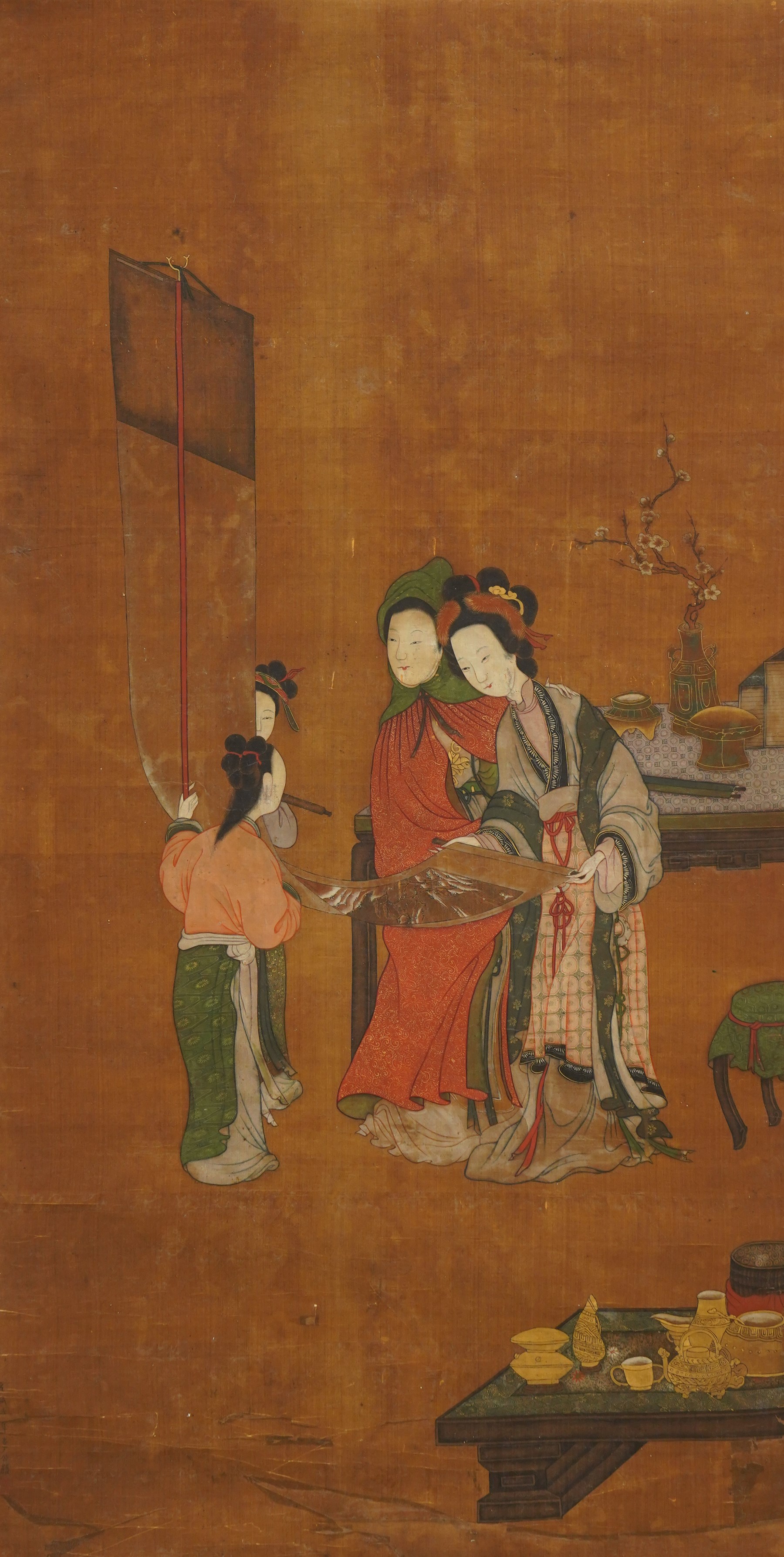 After Li Gonglin (Chinese 1049-1106): Court Ladies Examining a Scroll, 19th century hanging scroll, ink and pigments on silk with light brocade margins, bearing inscription, image size 101cm x 52cm 