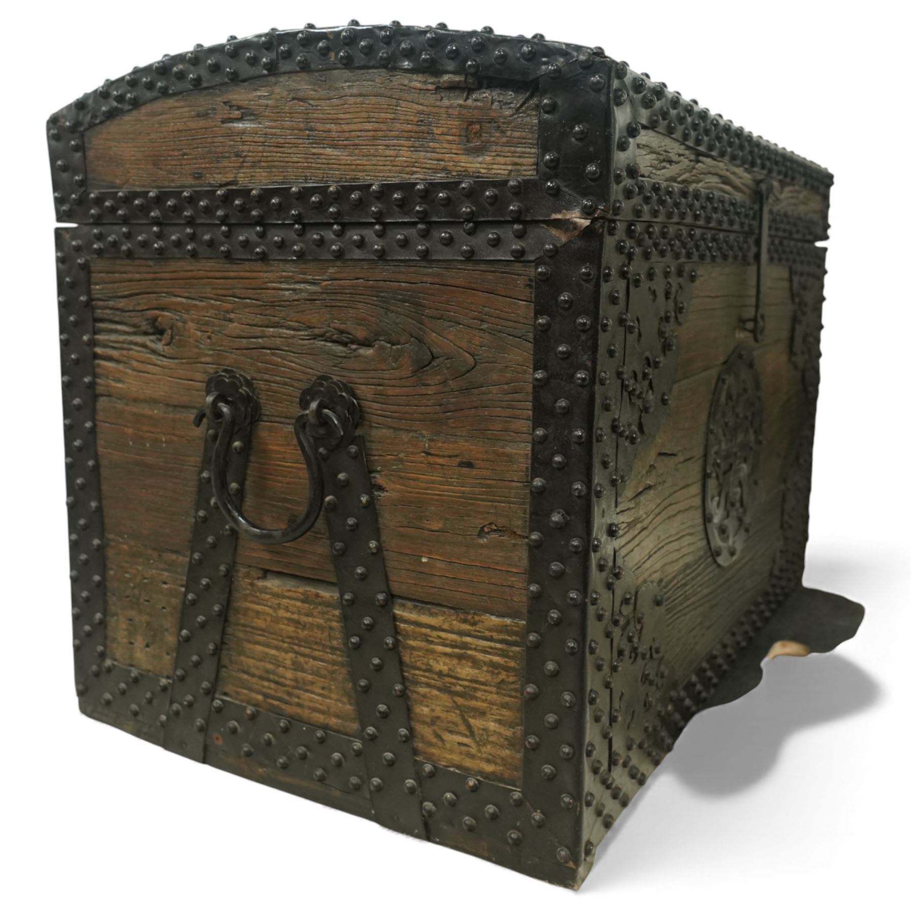 20th century Chinese camphorwood chest, the hinged lid opening to a plain interior, the exterior fitted with heavy iron strapwork, studded mounts and shaped corner plates, central circular lock escutcheon, with iron carrying handles