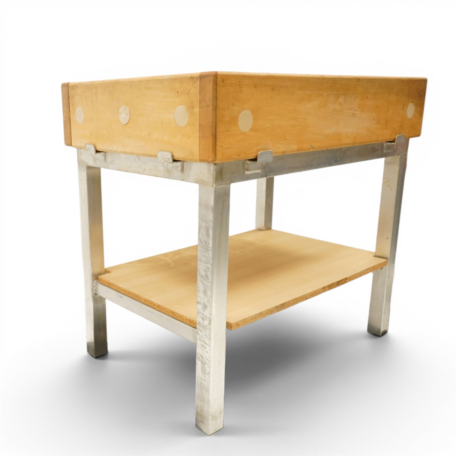 20th century butchers block kitchen island, solid top raised on stainless steel supports united by and undertier