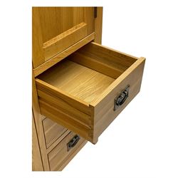 Light oak combination wardrobe, fitted with full-height compartment, single cupboard and three small drawers