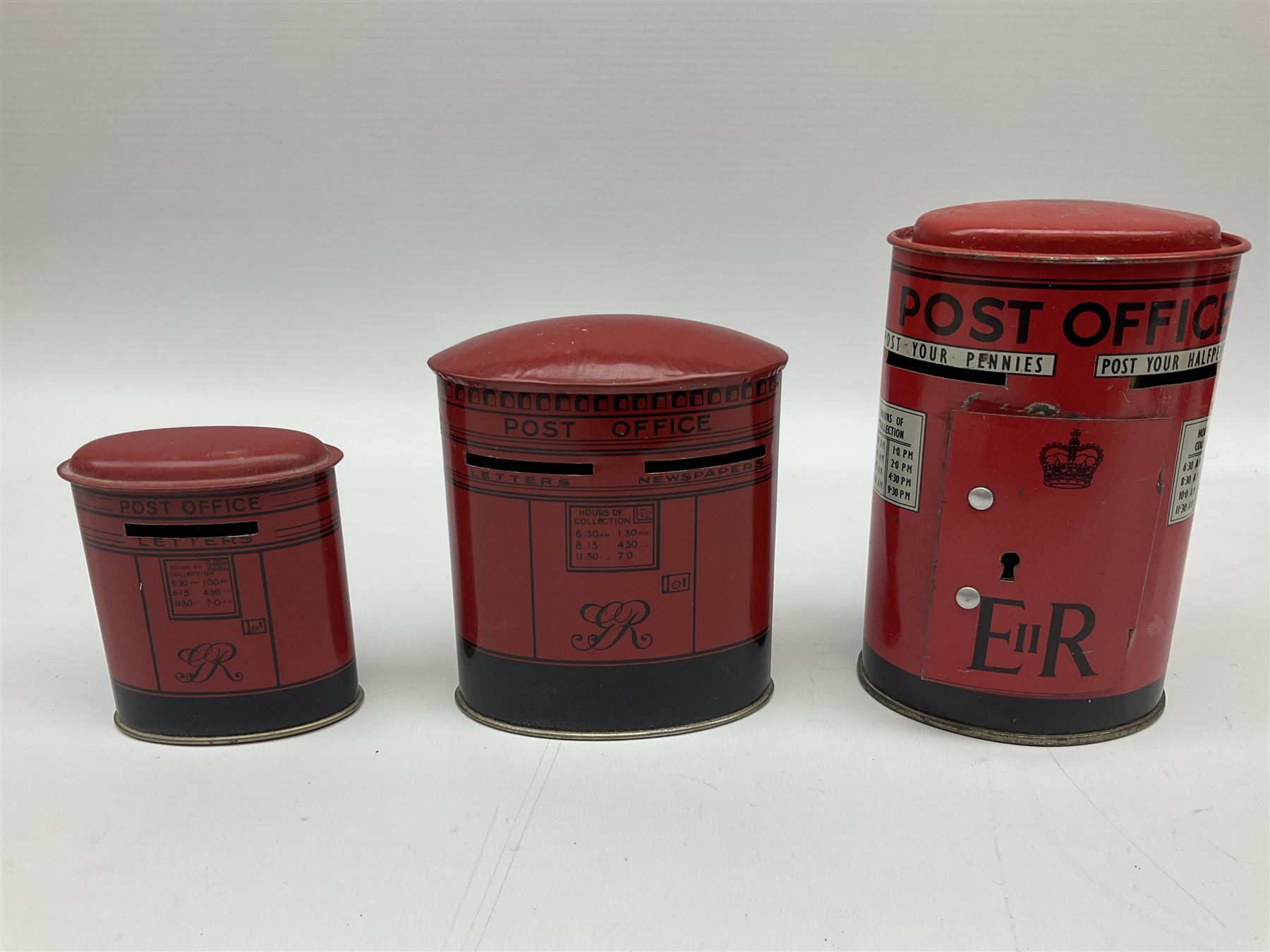 Collection of tin plate money boxes in the form of Royal Mail post boxes, to include four Chad Valley examples, one with key and others similar,  marked VR, GR and ER (10)