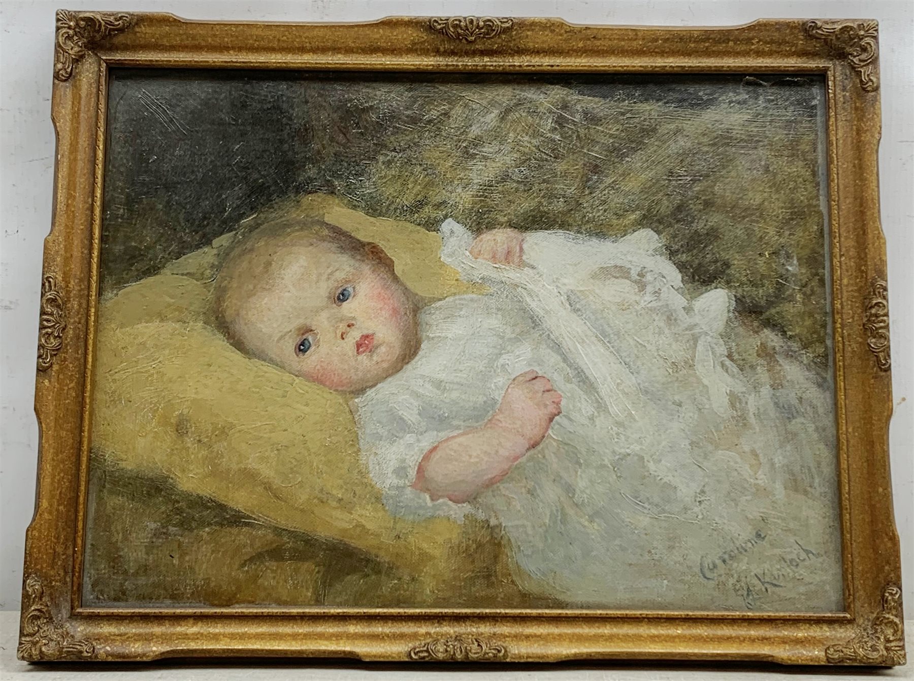E L Kinloch (American 1860-1923): 'Caroline' - Portrait of a Baby, oil on board signed and titled 29cm x 39cm