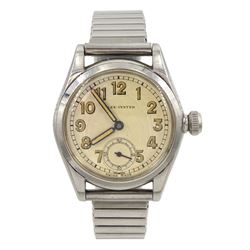 Rolex Oyster stainless steel manual wind wristwatch, circa 1941, Ref. 3121, serial No. 121094, cream dial with subsidiary seconds dial, on expanding stainless steel strap