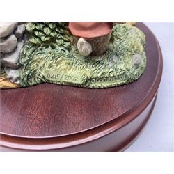 Four Border Fine Arts Beatrix Potter figures, comprising Tableau created to commemorate the Millenium together with a Border Fine Arts Limited Edition no 669814, The Tale of Peter Rabbit Tablet A1306, Four Little Rabbits A2442 and Sailing Home A2443